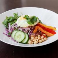 Chopped Thai Salad Bowl · Green and red cabbage, cilantro, peppers, carrots, cucumber, avocado, peanuts, cage free egg...