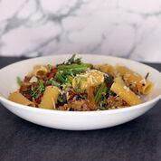 Rigatoni · Organic pomodoro, spicy Italian sausage, roasted peppers and onion, sprouting broccoli and g...