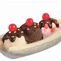 2.5 oz. Banana Split Sundae · 3 of your favorite ice cream flavors, 2 banana slices, your choice of wet topping, all crown...