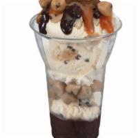2.5 oz. Chocolate Chip Cookie Dough Sundae · 3 scoops of Chocolate Chip Cookie Dough Ice Cream with layers of hot fudge and cookie dough ...