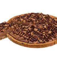 Peanut Butter n Chocolate and Reese's Peanut Butter Cup Polar Pizza · An ice cream treat you eat like pizza. A chocolate chip cookie crust with peanut butter n ch...