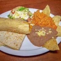 Combo Plate · Combine one taco with your choice of meat, plus one tamale and one quesadilla served with ri...