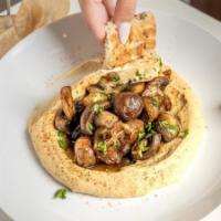 Hummus Mushroom · hummus, topped with grilled champignon mushrooms, & caramelized onions