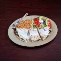 Fajita Quesadilla · Served with bell peppers and onions.