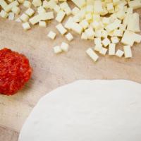 Build Your Own Pizza · Our Build your own is topped with mozzarella. Select your favorite sauce and toppings.