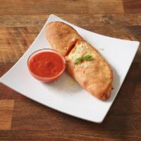 Calzone · Add toppings for an additional charge. 