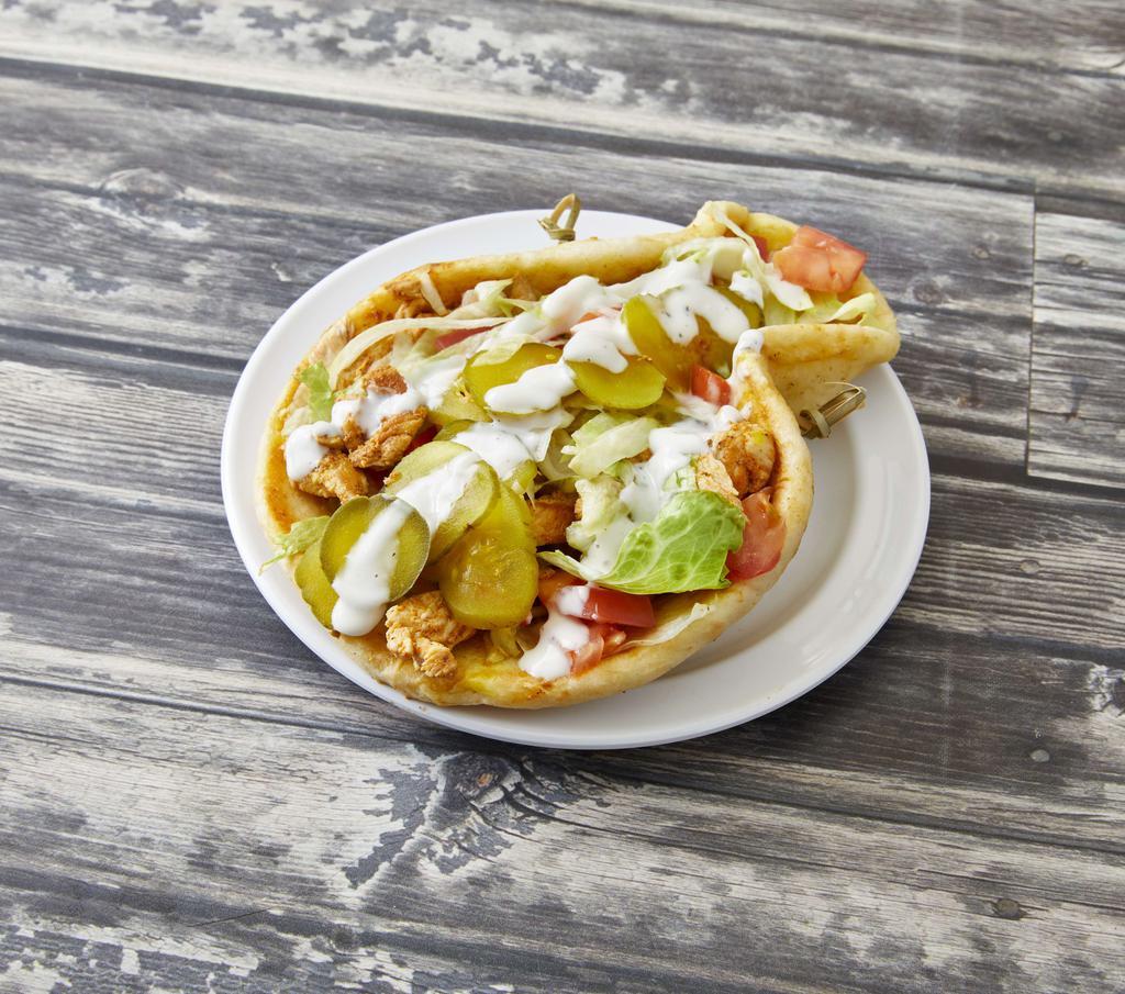 Grilled Chicken Pita · Lettuce, tomato, pickles, American cheese and ranch.