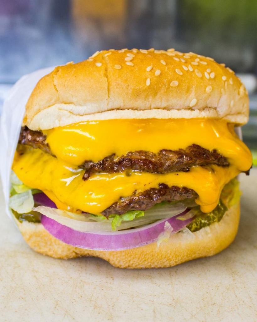 Double Cheeseburger Combo · Comes with 1000 island sauce lettuce, sliced tomato, pickle and slide onion.

