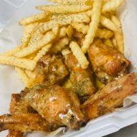 Moe’s Wings  · 6 piece party wings fried naked with choice of sauce: lemon pepper, garlic parm, mild, teriy...