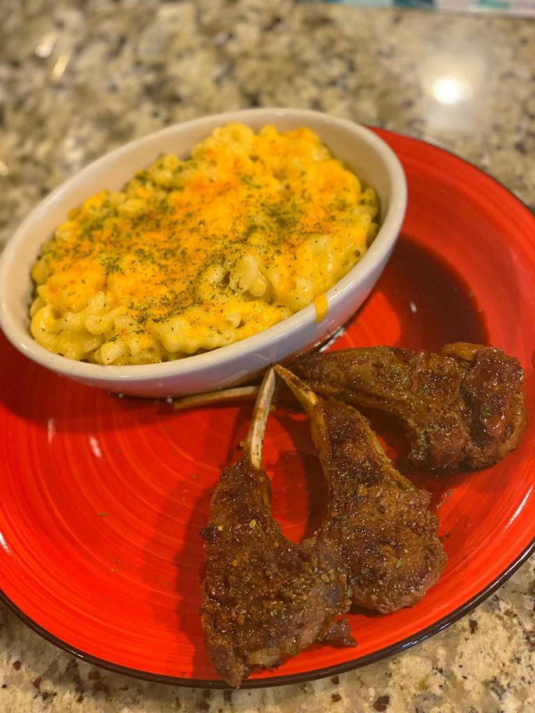Lamb Chops Dinner · 3 lamb chops seasoned served with greens & Mac N’Cheese