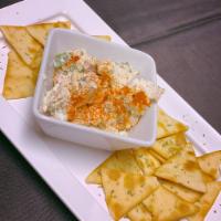 Seafood Dip  · salmon, shrimp, cream and mozzarella cheese, onions, spinach w/pita chips 