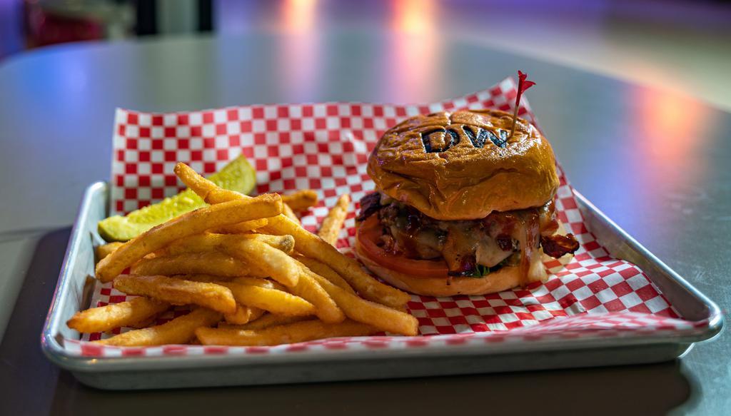 DW Brewburger · Our brew burgers are hand made with a 1/2 lb of grass-feed certified Angus beef, lettuce, tomato, dill spear (fries separate)