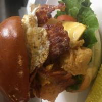 Bacon, Egg & Cheese Burger · Hand made 1/2 lb of grass-feed certified Angus beef brew burger topped with  maple smoked ba...