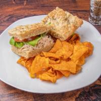 Chicken Salad Sandwich · Chicken salad with apples and cranberries, served on your choice of bread with lettuce and t...