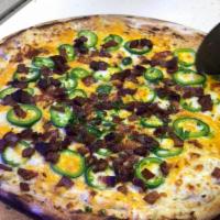 Jalapeno Popper Pizza :This Week's Specialty Pizza · Jalapeno Popper Pizza,with a cream cheese and sour cream base, topped with thick bacon , fre...