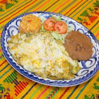 Chilaquiles con Carne · Chilaquiles and chopped meat.