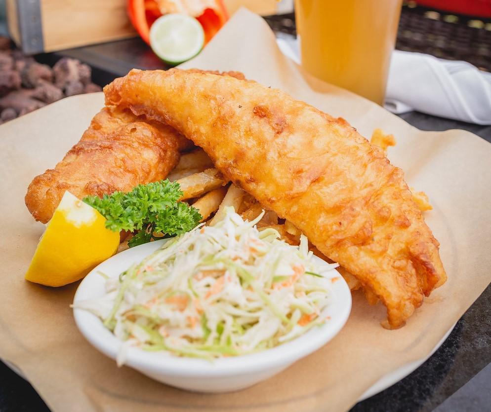Waxy's Fish and Chips · Beer battered local haddock served with fries, coleslaw and tartar sauce and lemon.