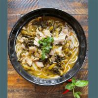 Fish Fillet & pickled cabbage with rice noodles 酸菜鱼米线 · 