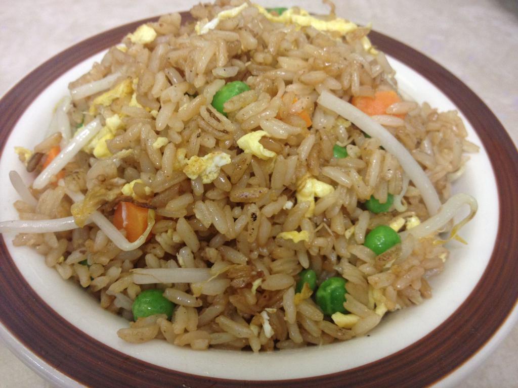 J15. House Special Fried Rice 什锦炒饭 · Stir-fried rice.