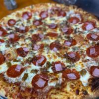 Meat Lovers Pizza · Pepperoni, bacon, ham, and Italian sausage.