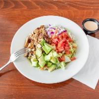 Grilled Chicken Salad · Lettuce slices, avocado, tomatoes, onions, shredded carrots, and cheese. Served with grilled...