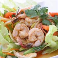 Spicy Shrimp Salad · Grilled shrimp, green onion, and tomatoes in spicy lime dressing. Gluten free.