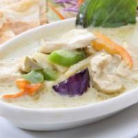 Green Curry · Thai green curry with coconut milk, eggplant, bamboo shoots, bell peppers, and sweet basil. ...