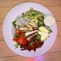 Bluff Cobb Salad · mixed greens with hard boiled egg, avocado, bacon, bleu cheese crumbles, and grilled chicken
