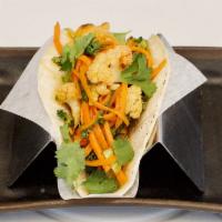 Spicy Cauliflower Taco · Baby bok choy and carrots, pickled in mirin vinegar.