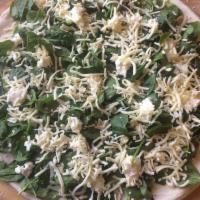 White Spinach Pizza · Spinach, sliced tomatoes, ricotta, mozzarella, romano, olive oil, oregano, and garlic.