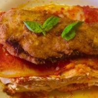 Homemade Cheese Lasagna with Chicken · Feeds two people, cooked to order, with two pieces of freshly baked bread.