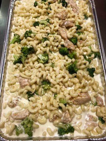 Pasta Alfredo Style · Cream, butter and parsley tossed with pasta. Feeds two people, cooked to order, with two pieces of freshly baked bread.