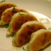 11. Pot Stickers · Homemade steamed and pan-fried pot stickers. Stuffed with pork and vegetables.