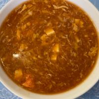 35. Hot and Sour Soup · Tomato, tofu, bamboo shoots, and eggs cooked in sweet, sour, and spicy tomato base. Spicy.