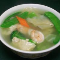 38. War wonton soup · Homemade wontons, char Siu, shrimp, chicken, and assorted vegetables cooked in chicken broth.