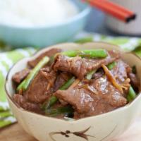 91. Ginger and Scallions with Beef · Beef, ginger and green onions. Sauteed in brown sauce.
