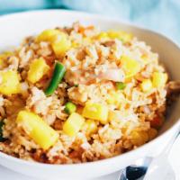 100. Pineapple Chicken Fried Rice · White meat chicken, pineapples, peas, carrots and egg fried rice.