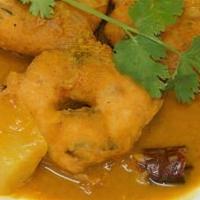 Sambar Meduvada · 2 pieces of Donut-shaped Indian crispy fritters made with spiced urad dhal batter and soaked...