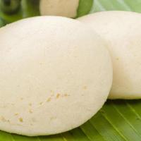 Idli · 3 pieces of Soft and spongy steamed rice cakes served with sambar (lentil based vegetable st...