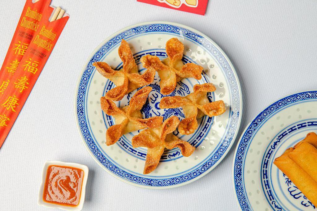 Dungeness Crab Rangoon · 5 pieces. pockets of crab meat and cream cheese
