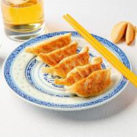 Potstickers (Pork + Veggie) · 6 Pan fried crispy dumplings with housemade dipping sauce