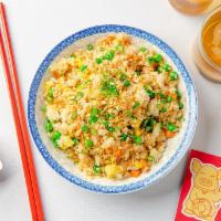 Fried Rice (Veggie) · Golden fried rice with eggs, onions, peas, carrots, and scallions. Gluten-free and vegetarian