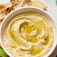 Hummus · Check peas - Vegetarian  Appetizer and served w/ a piece of pita bread 