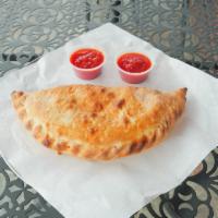 Ricotta and Mozzarella Calzone · Stuffed with ricotta, mozzarella, and your choice of fillings. Marinara sauce on the side.