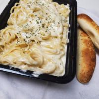 Fettuccine Alfredo Entree · Served with garlic bread sticks.

