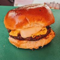 Sausage Egg and Cheese Sandwich · All-beef sausage patty, scrambled egg, wallaby and Vermeer cheese, brioche roll.