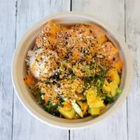 Spicy Miso Mango Salmon Bowl · This refreshing combination features our spicy miso salmon mixed with mangoes, green onions,...