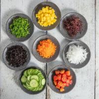Veggie Bowl · Choose 4-mix ins combined with sauces, and toppings over rice or veggies.