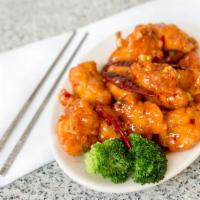 General Tso's Chicken · Crispy chunks of boneless chicken marinated in red hot sauce. Hot and spicy.