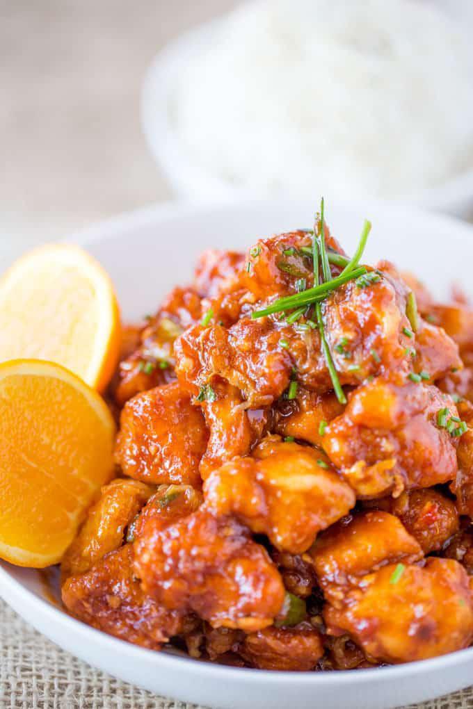Orange Chicken · Tender chunks of chicken in a lightly battered and sauteed with hot spicy orange sauce. Hot and spicy.